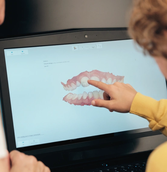 Dentist performing a routine dental cleaning and examination.