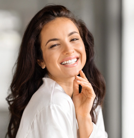 Patient smiling after a comfortable dental appointment.