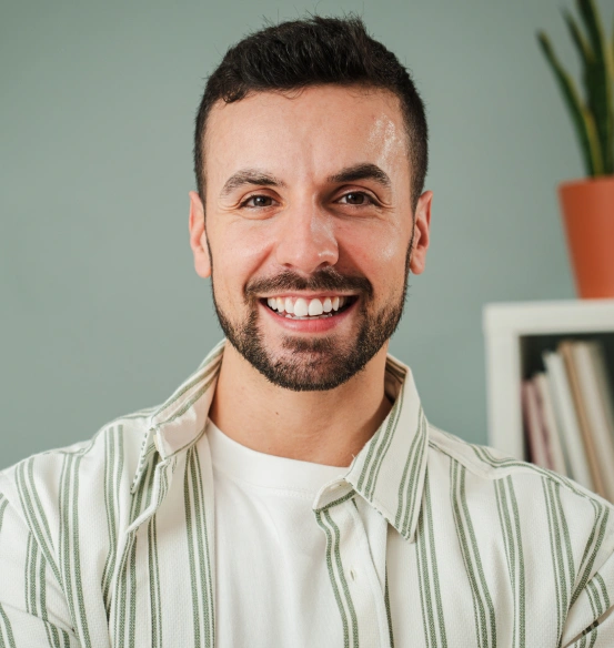 Smiling patient after professional teeth whitening.